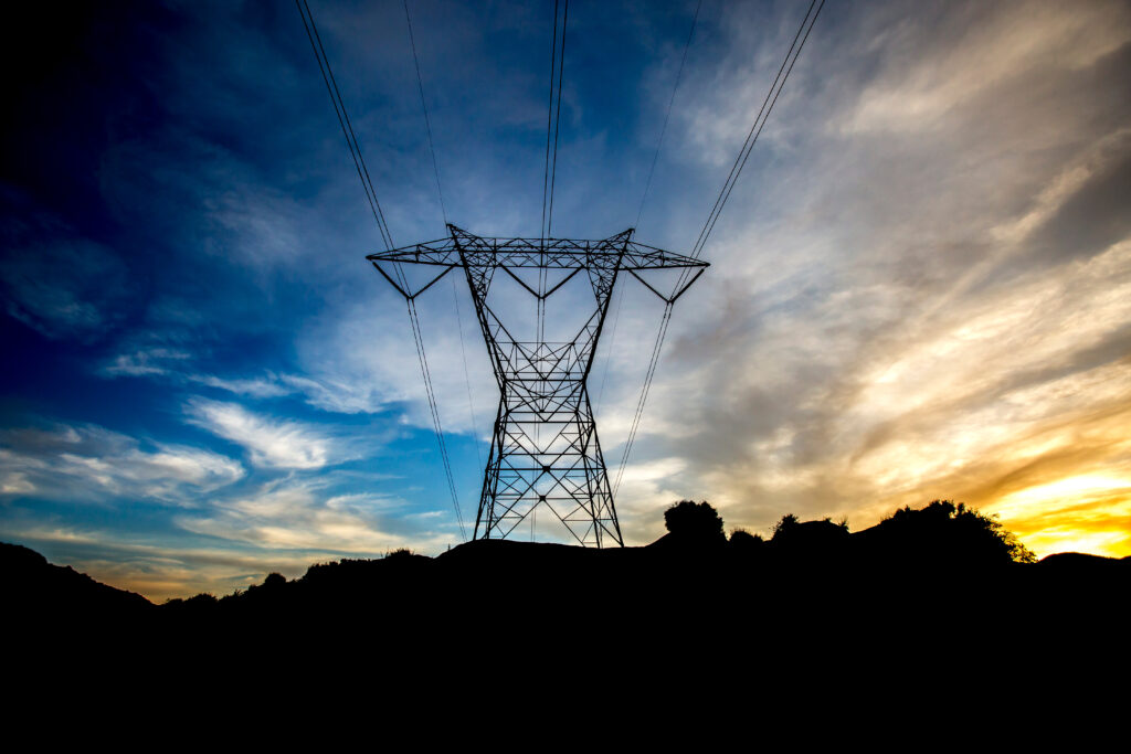 Symmetrical Electrical tower near sunset